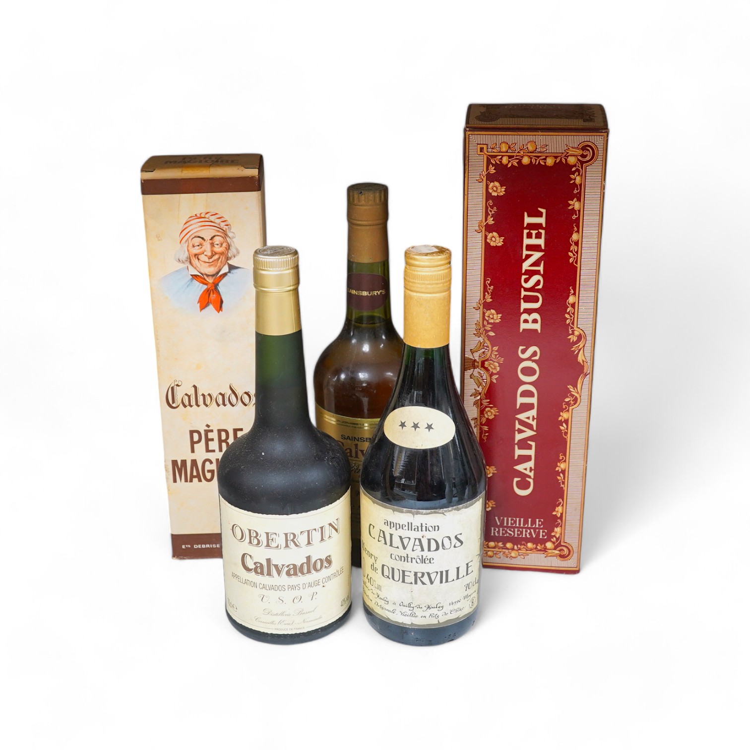 Five various bottles of Calvados, including a boxed Paul Magloire and boxed Busnel. Condition - unknown storage